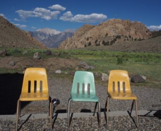 Re-purposed classroom chairs now being used for catering. The chair in the middle is exactly 50 years old!