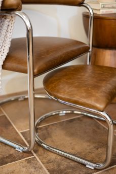 The Lorren Ottoman in Brown-Olive