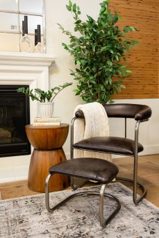 The Lorren Chair and Ottoman Set in Cafe’ and Natural Steel