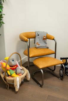 The Lorren Ottoman in Light Honey and Natural Steel